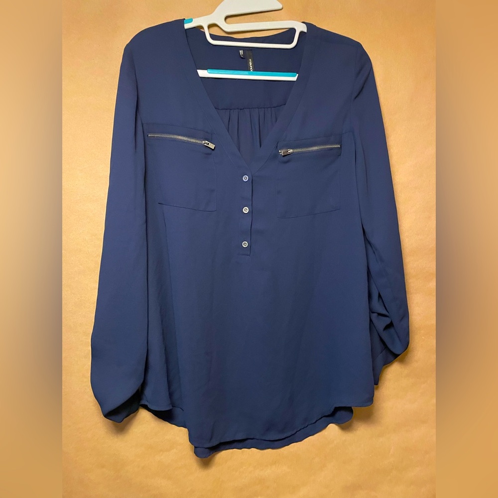 Great shirt for an office environment. Light breathable material